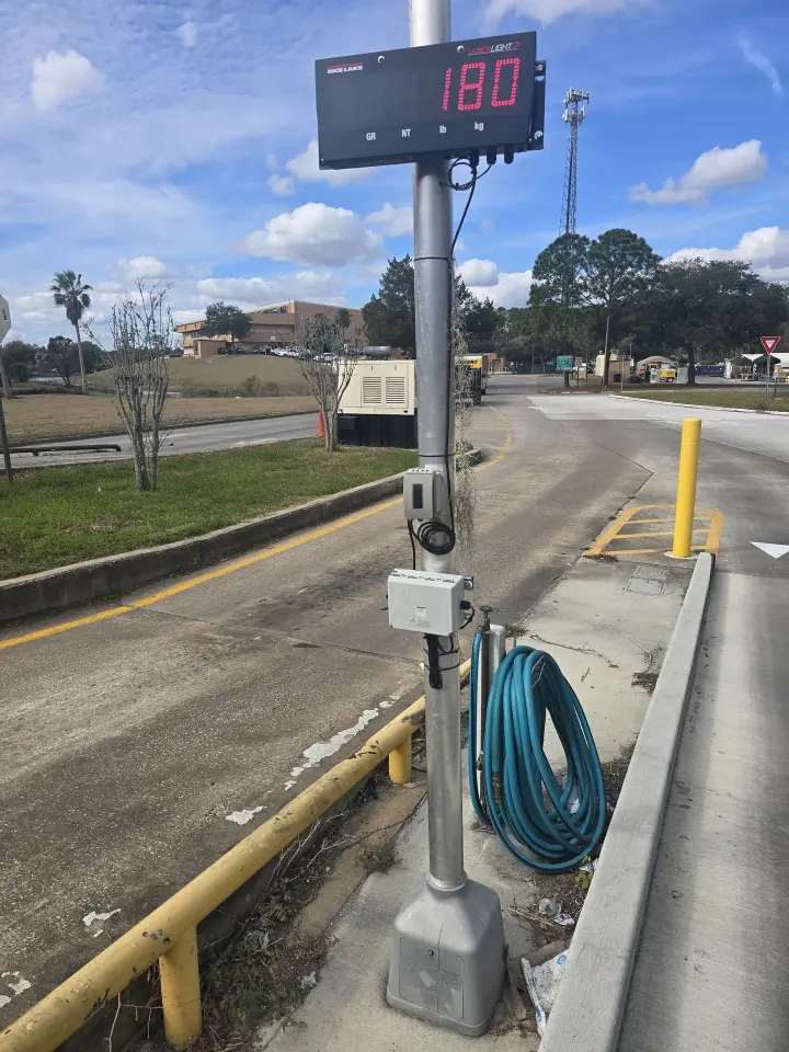 Truck scale remote display with water hose and 110volt outlet